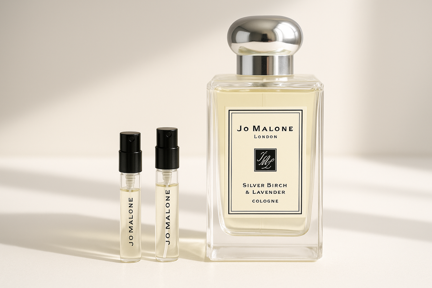 Jo Malone Silver Birch & Lavender Cologne parfumstaaltjes 1 ml standing next to Jo Malone Silver Birch 100 ml fragrance